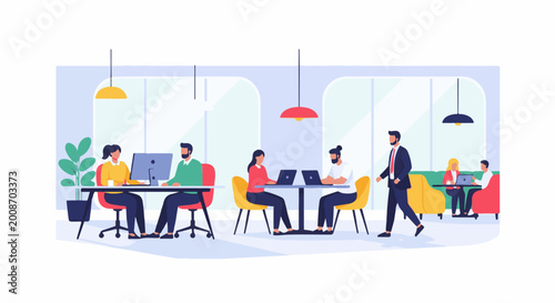 Modern office space with individuals working on computers