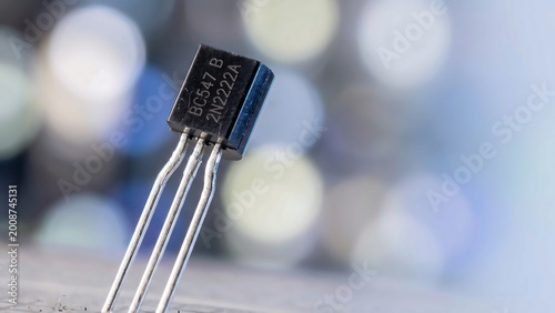 Macro of Black Bipolar Transistor on Breadboard with Soft Laboratory Bokeh