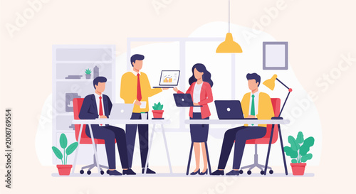 People collaborating in an office setting, working on laptops and discussing projects