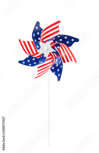 Red white and blue patriotic USA pinwheel with stars and stripes isolated on white background. American flag themed decoration and cut out design element with clipping path for Independence Day