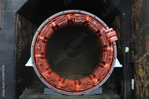 Tableau sur toile Large electric motor stator with copper windings in industrial workshop