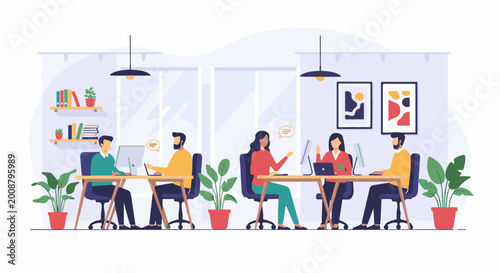 Diverse team collaborating and working on computers in a modern office space