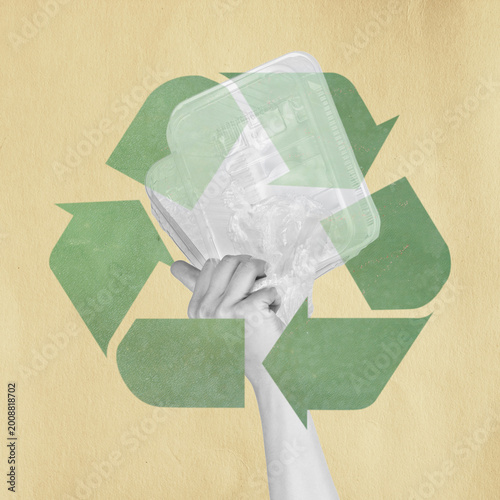 Hand holding plastic packaging and crumpled wrap against a recycling symbol, promoting sustainability