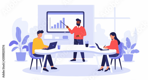 People in a meeting room with a presenter at a chart and two attendees on laptops