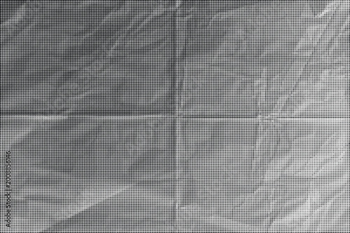 A close-up view of a crumpled gray paper background with creases