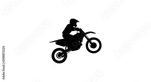 Tableau sur toile Silhouette of a Dirt Bike Rider Mid-Air Jump