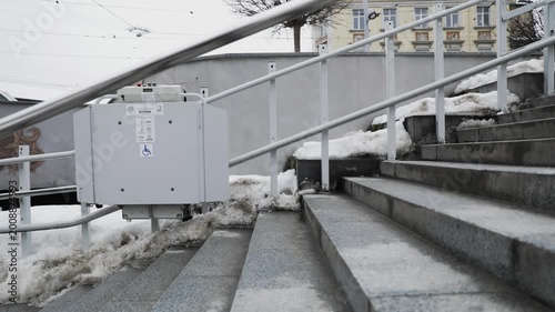 Wheelchair Platform Lift Installed on Outdoor Stairs in Winter
