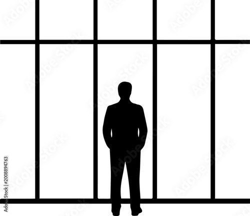 Cuadro en lienzo Silhouette of a Businessman in a Suit Standing in Front of a Large Office Window