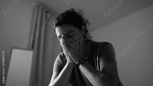 Bilde på lerret Exhausted woman covering face with hands in frustration and emotional distress a