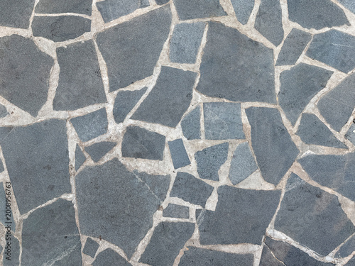 Fotografía Natural random cut dark grey flagstone flattened on a surface