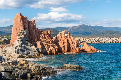 Tableau sur toile The famous red porphyry rocks known as Rocce Rosse at the port of Arbatax, Sardinia, Italy