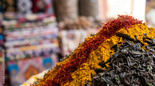 Obraz na plátně vibrant moroccan spice market close-up with colorful turmeric and saffron