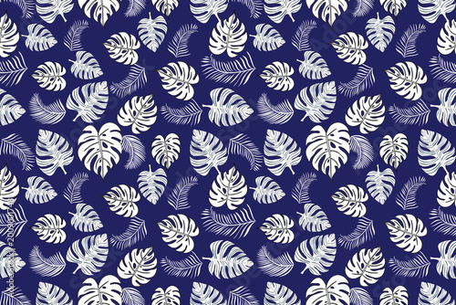 Photos Seamless Hawaiian floral pattern in elegant blue tones, featuring tropical flowers and leaves arranged in a balanced composition