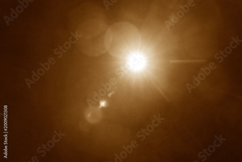 Sun rays beams sunrays with bokeh on yellow golden gold sky background. Summertime summer season picture with sunburst sunbeams. Bright sunny illustration Abstract colorful banner template. sunburst