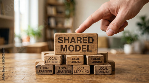 Federated learning network shared model concept with hand pointing at wooden block stack in home office