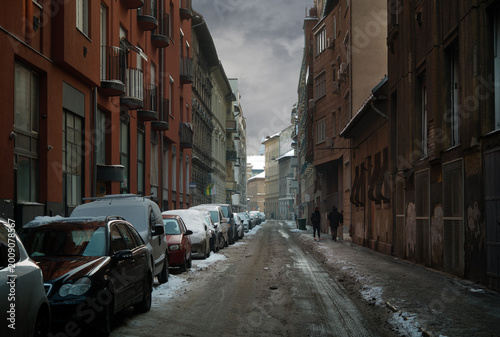 Photos Gloomy Street with Snow-Covered Cars