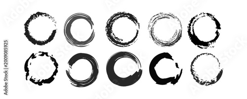 Collection of Black and White Ink Brush Stroke Circles on White Background for Artistic and Creative Designs