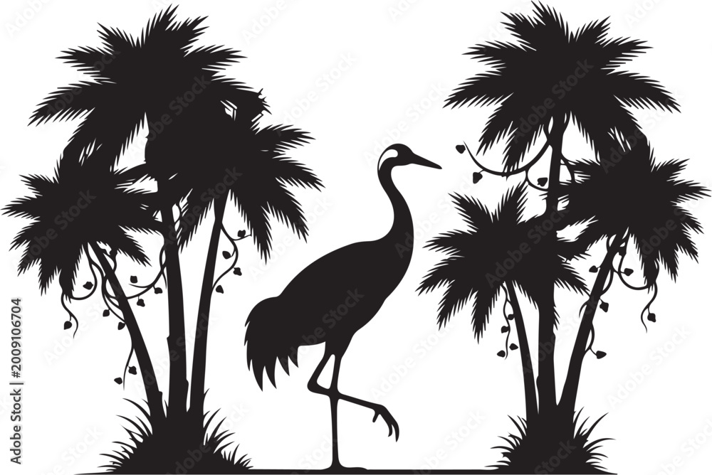 Fototapeta premium Black silhouette of a crane standing between two palm trees