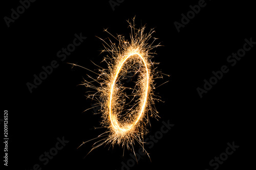 Foto Illuminated Sparkler with Glowing Oval Shape, Holiday Fireworks at Night