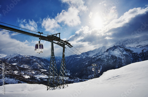 View of the gondola traveling up the Valtournenche valley from the Cervino Ski area, Italian alps, Italy, Europe 