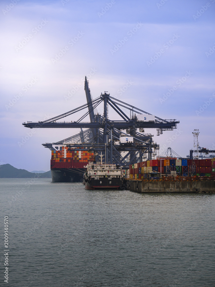 Fototapeta premium Cargo ships and container cranes at Yantian Port, Shenzhen