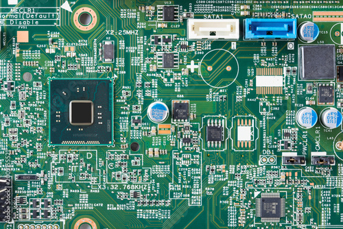 Photography Close-Up of Computer Motherboard Circuit Board with Microchip and SATA Ports
