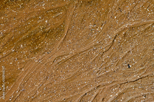 Vászonkép Rill marks formed on a sandy surface on sea beach