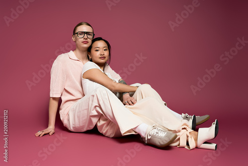 Young couple sharing a tender moment together in a cozy and colorful setting