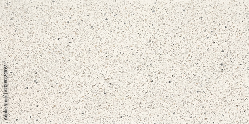 Foto A detailed shot of a textured surface, possibly a wall or countertop, revealing a unique speckled pattern
