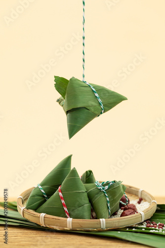 Traditional zongzi rice dumplings wrapped in bamboo leaves for Dragon Boat Festival