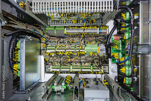 Foto Comprehensive interior view of a complex industrial electrical control cabinet w