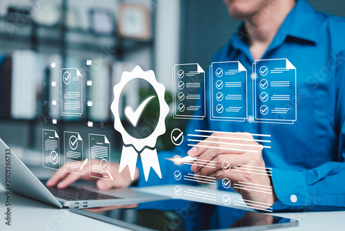Obraz na płótnie Quality assurance compliance concept, professional reviewing digital documents w