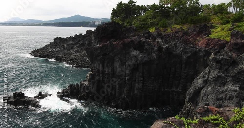 Daepo Jusangjeolli Cliff landscape, Jeju island, volcanic rock formation, Jeju-do, South Korea, Ieodo-ro, Seogwipo, Jeju Province, Columnar jointing view with waves and sea, Korean Natural Monument