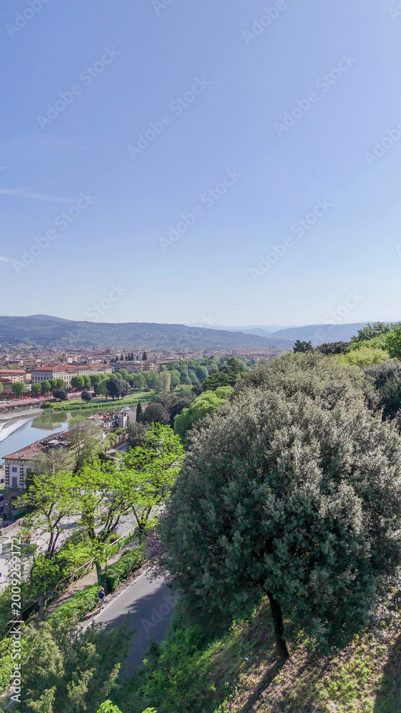 Obraz premium Aerial drone view Florence Lungarni Arno River banks with historic buildings colorful facades Ponte Vecchio and Tuscan cityscape