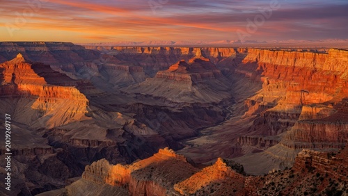 Grand Canyon at Sunset with Vibrant Sky and Layered Rock Formations