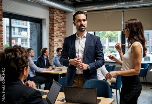 Modern Office Team Discussion with Natural Light and Brick Interior