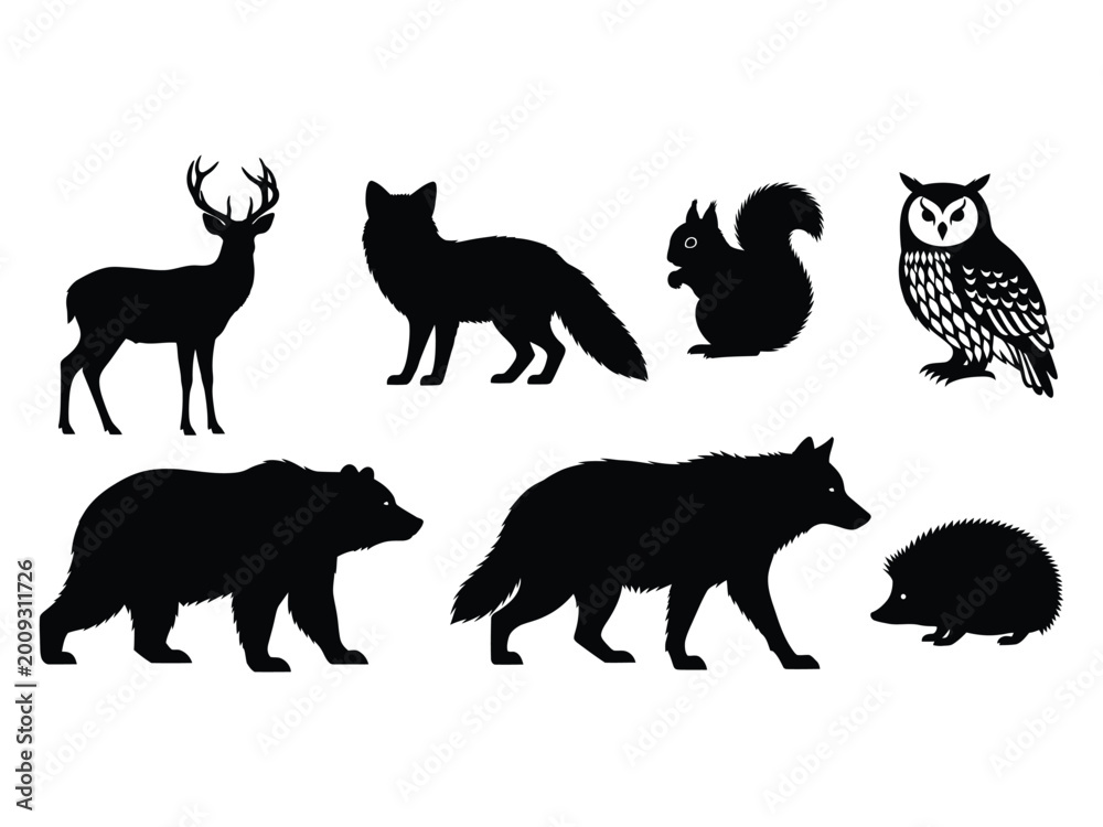 Fototapeta premium Collection of black silhouettes of forest animals including deer, fox, squirrel, owl, bear, wolf, and hedgehog