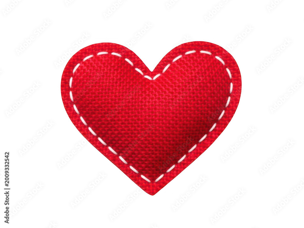 Fototapeta premium A charming red heart adorned with delicate white embroidery stitching