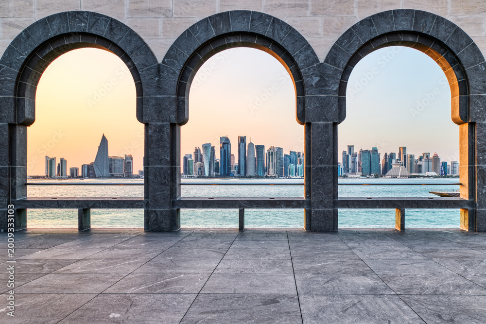 Fototapeta premium Doha Skyline View through Elegant Marble Arches
