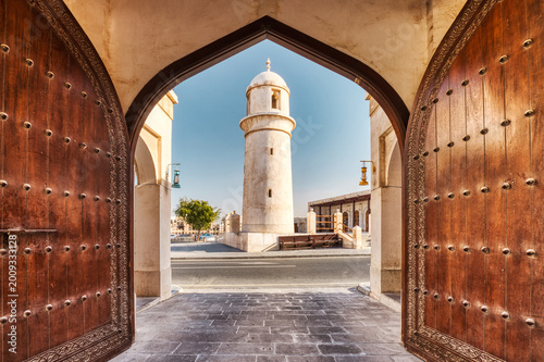 Traditional Arched Doorway framing Souq Waqif Minaret