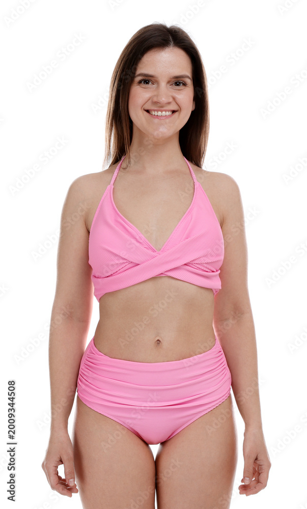 Fototapeta premium Woman in pink swimsuit on white background