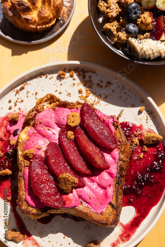 rhubarb french toast with berry compote at brunch restaurant