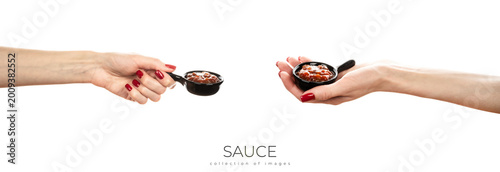 Photos Bowl with red sauce isolated on white background