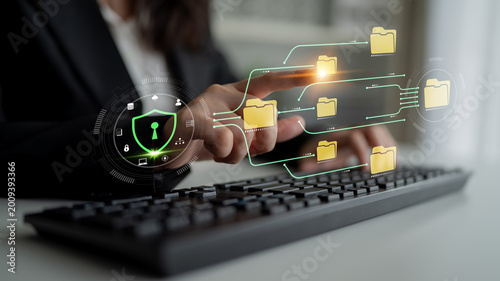 Photos Secure Data Management Concept with Digital Lock Symbol Overlaid on Keyboard Demonstrating Cybersecurity and Information Technology Practices Fluxor