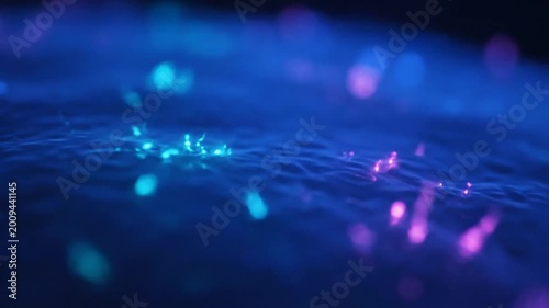 Glowing blue and pink light spots.