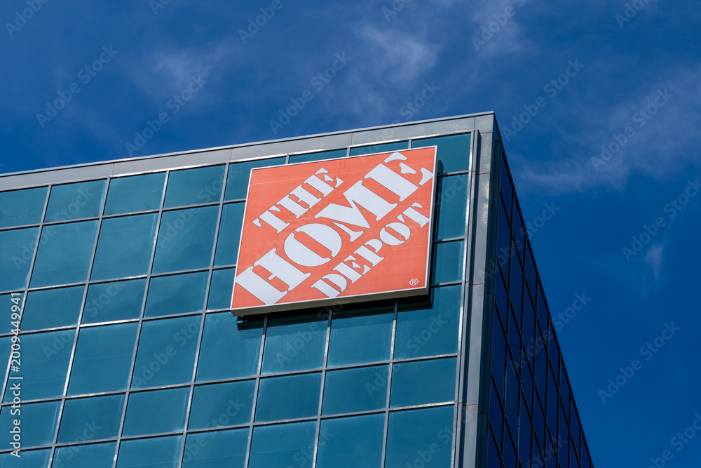 Fototapeta premium North York, Ontario, Canada - April 26, 2026: Close up of The Home Depot logo sign on their Canadian headquarters building in North York, Ontario, Canada. Home Depot is an American multinational home 