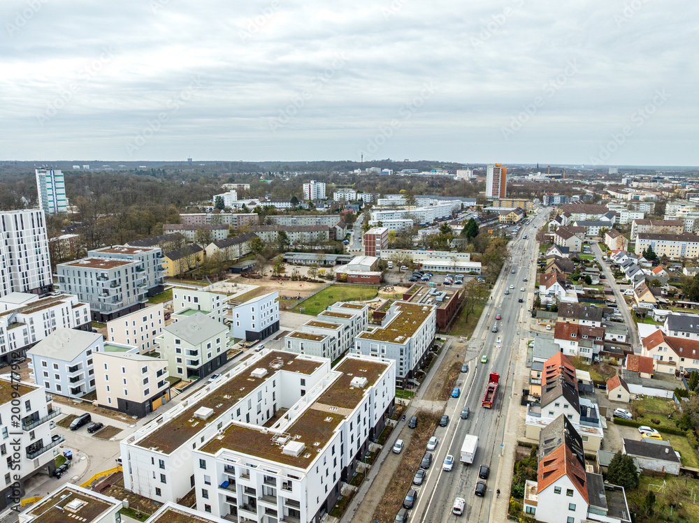 Fototapeta premium Drone aerial of modern housing development Hellwinkel-Terrassen in Wolfsburg-Stadtmitte, Germany