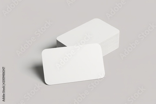 Stack of blank business cards with rounded corners mockup on a solid light gray background