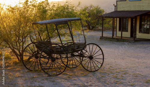 Historic Horse Drawn Buggy at Sunset in the Old West