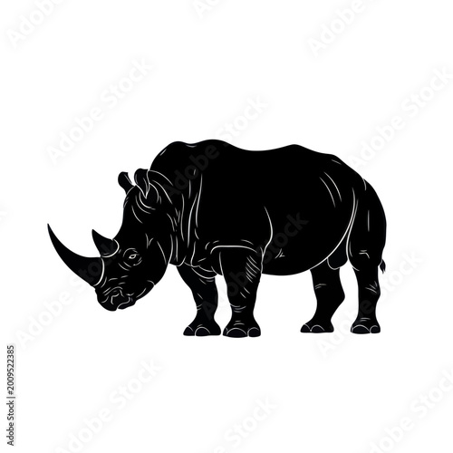 Silhouette of a Powerful Rhinoceros with Prominent Horns.